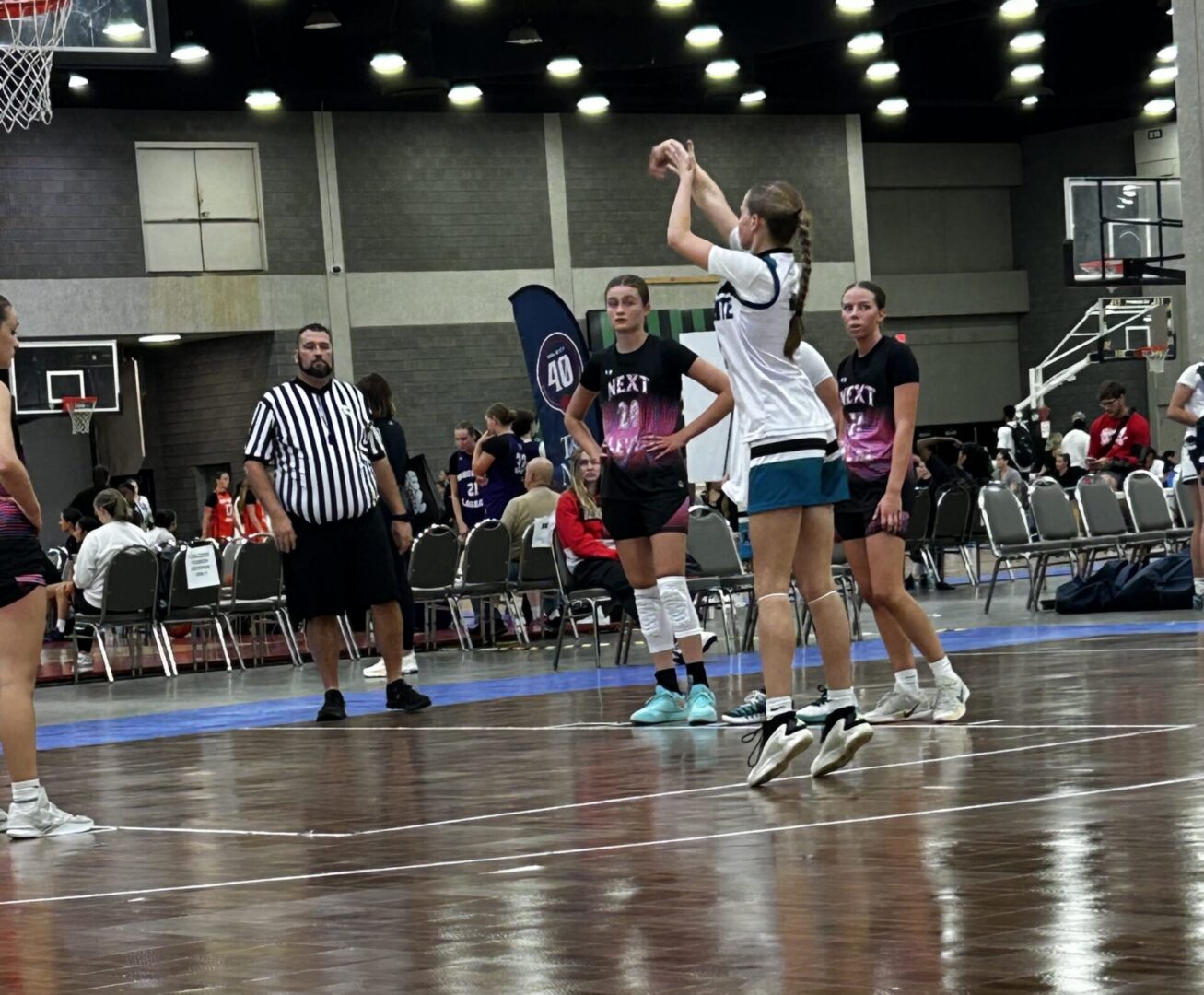 Player preparing to take a free throw shot.